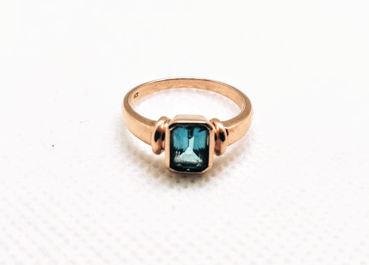 9ct rose gold and blue topaz ring