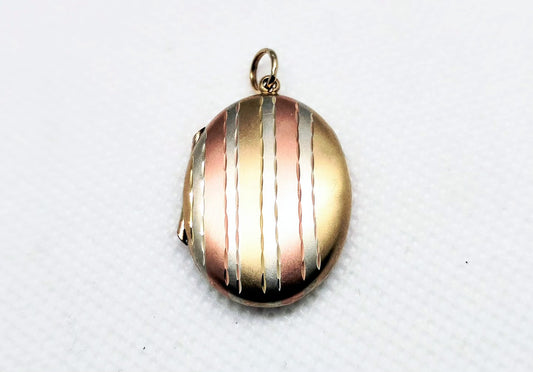 Pinstriped 9ct gold three tone locket - Birmingham hallmarks 1984