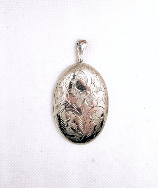 Large engraved sterling silver locket